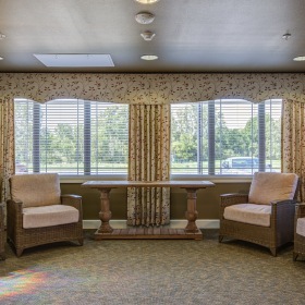 Four sofa chairs in the living room with natural light