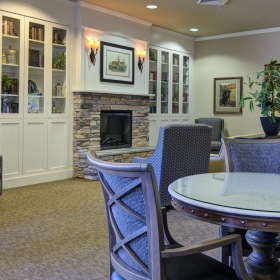 Living room with fireplace and chairs