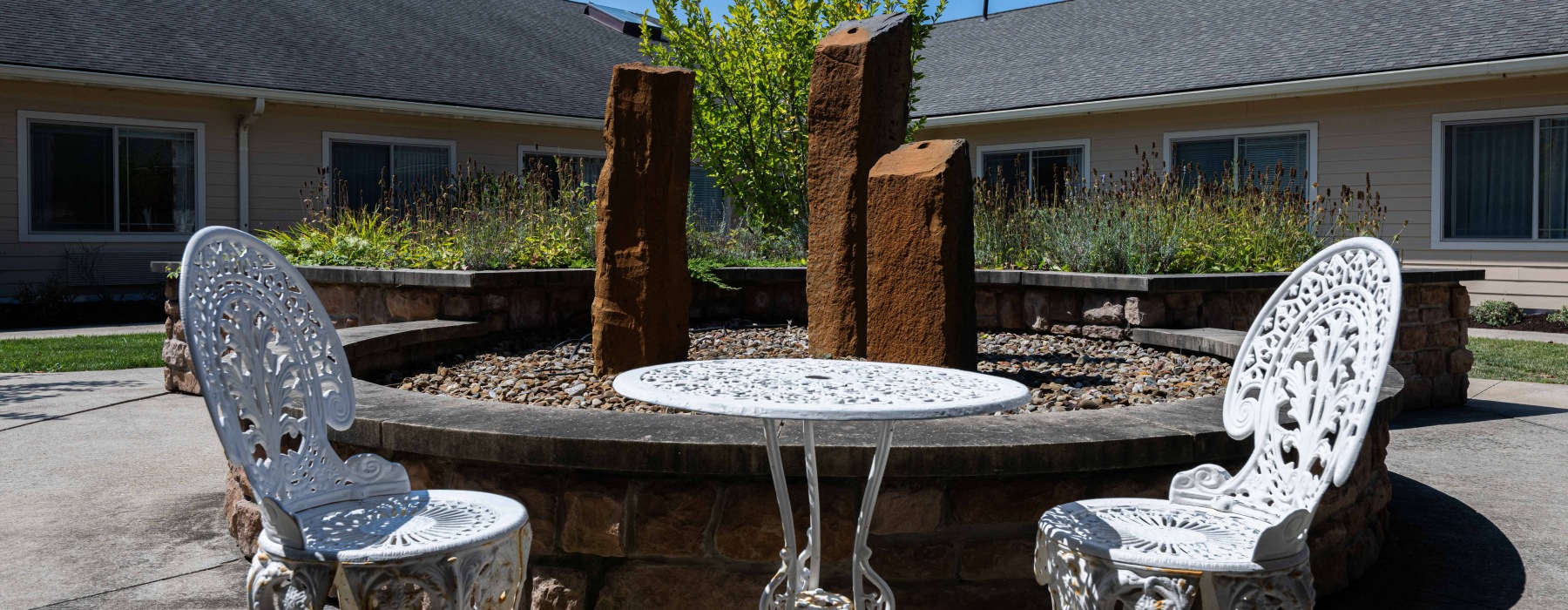 Outdoor courtyard with table and chairs